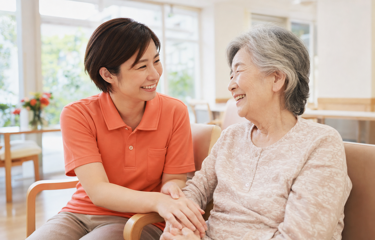 利用者と向き合うスタッフ